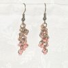 Caption: Blushed Bronze – Handmade dangle earrings featuring 18 beads in soft pink and mauve shades with bronze-colored jump rings and matching earring hooks.
