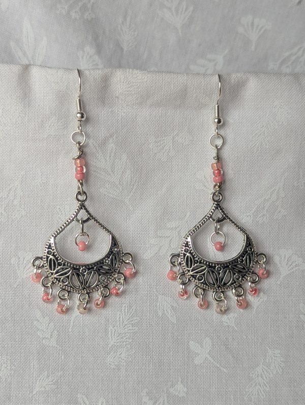 Soft Blossom chandelier earrings with Tibetan ornament, featuring 11 beads in pale pink and cream hues.
