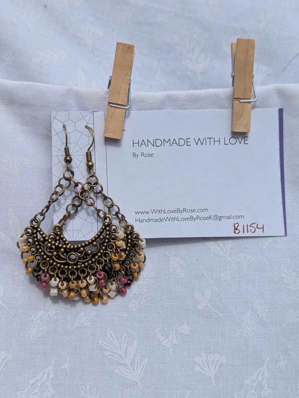 Desert Bloom Earrings: Tibetan-style bronze earrings with 30 glass beads in earthy tan, pearly beige, rose, wine red, and pearly cream.