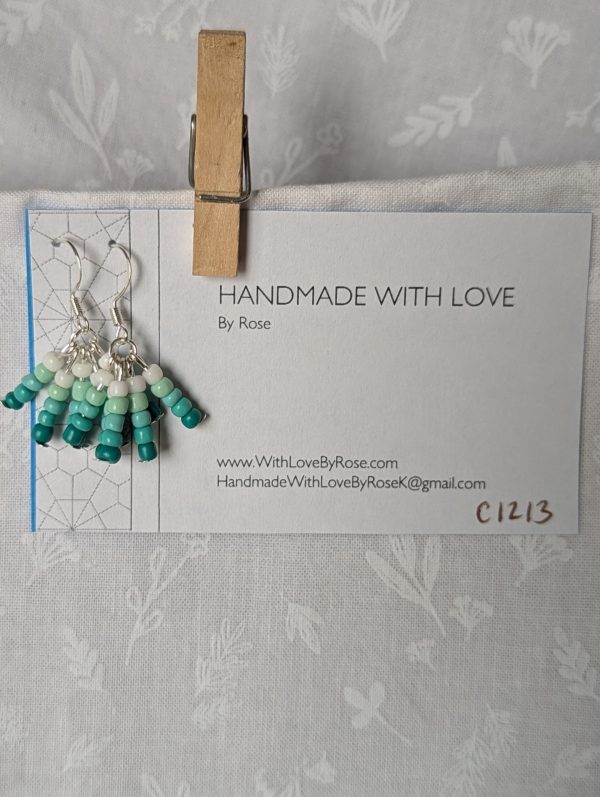 Seafoam Fade teal gradient earrings with five ocean-toned teals and silver fittings.