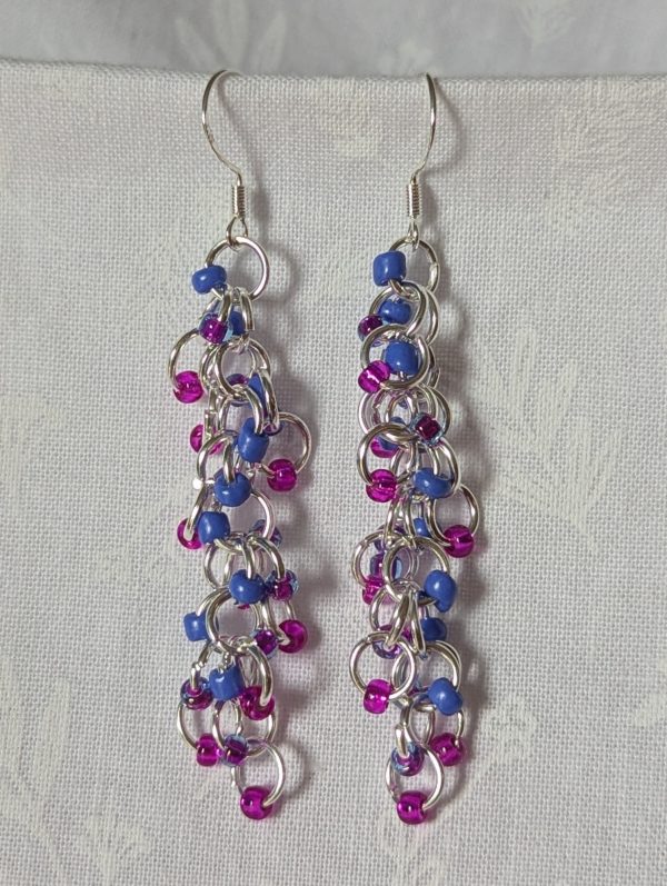 Electric Bloom Earrings with 27 beads in silver-lined hot pink, solid periwinkle, and pink-lined blue, linked with thick silver rings and sterling silver hooks.