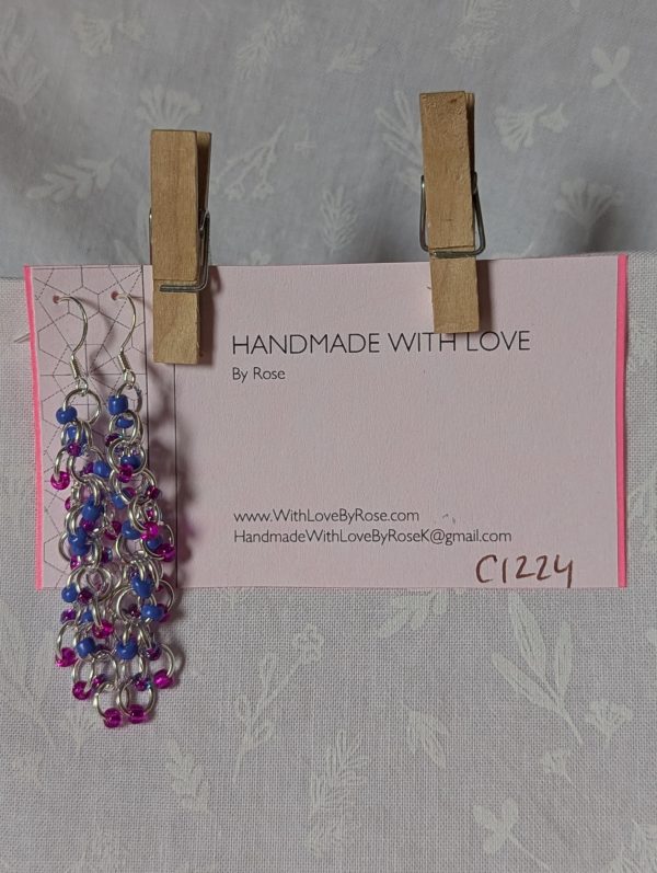 Electric Bloom Earrings with 27 beads in silver-lined hot pink, solid periwinkle, and pink-lined blue, linked with thick silver rings and sterling silver hooks.