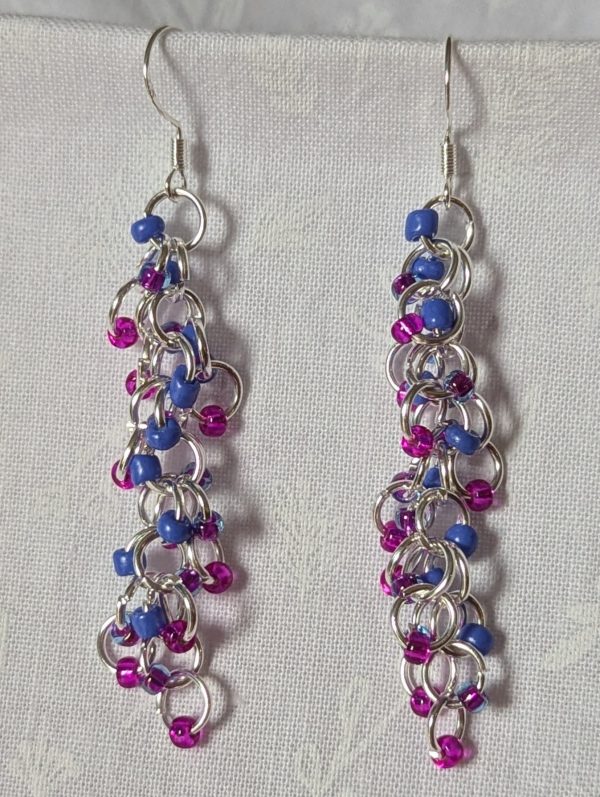 Electric Bloom Earrings with 27 beads in silver-lined hot pink, solid periwinkle, and pink-lined blue, linked with thick silver rings and sterling silver hooks.