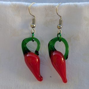 Handmade red pepper earrings featuring a single glossy red glass chili pepper bead with a green aluminum jump ring on steel hooks.