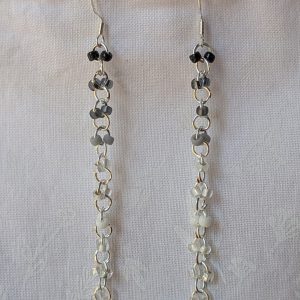 Handmade black and white gradient earrings with 20 glass beads connected by silver metal links and sterling silver hooks.