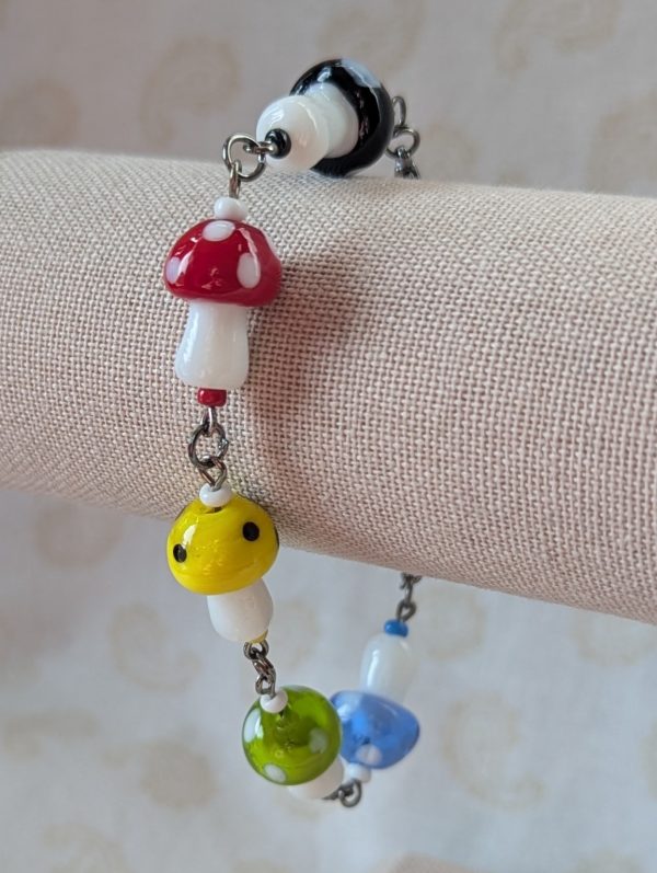 Class Mushroom Charm Bracelet with colorful lampwork glass mushroom beads linked on a tungsten-colored chain with lobster clasp.